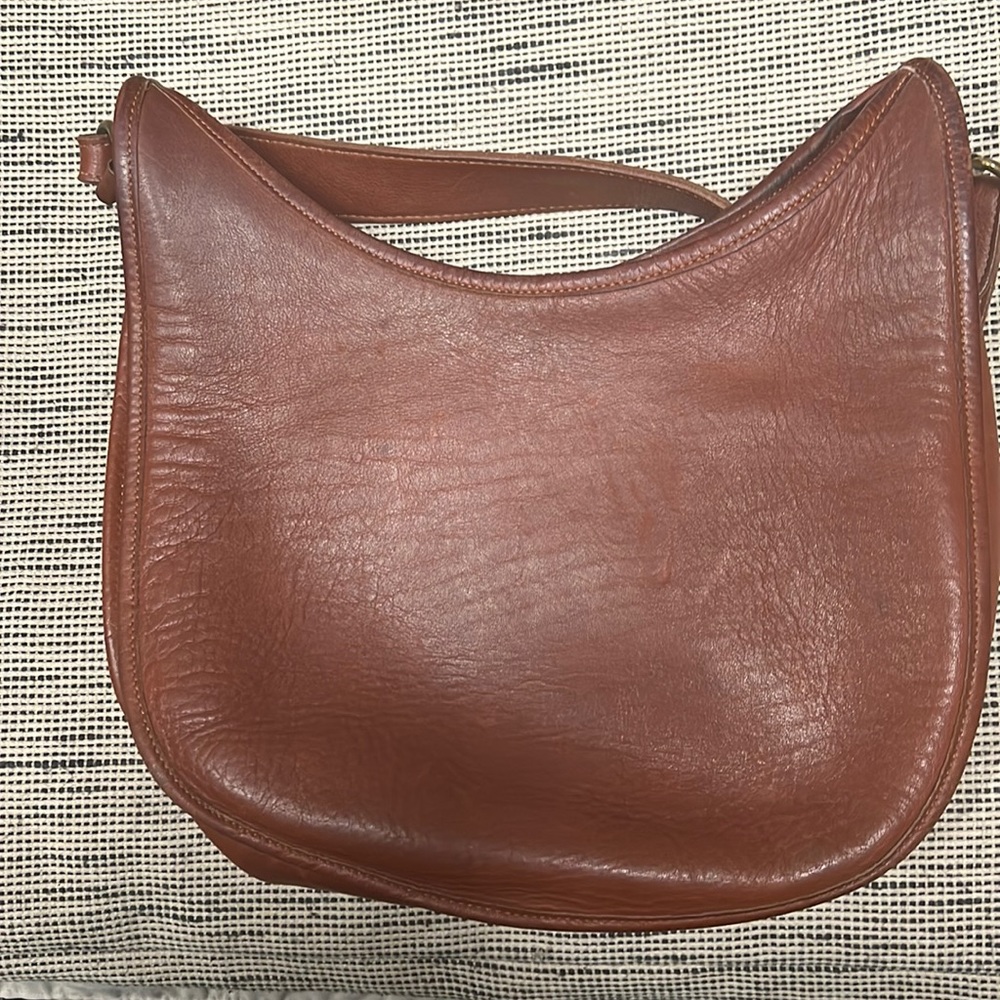 Brown leather saddlebag purse